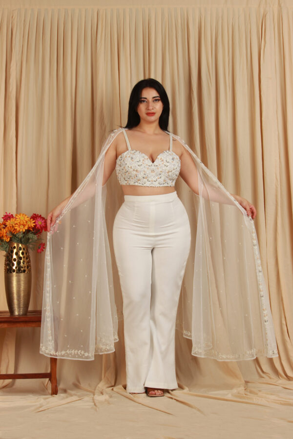 White co-ord set with embroidered bustier and sheer shrug
